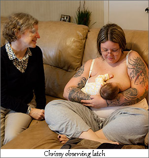 IBCLC giving breastfeeding help